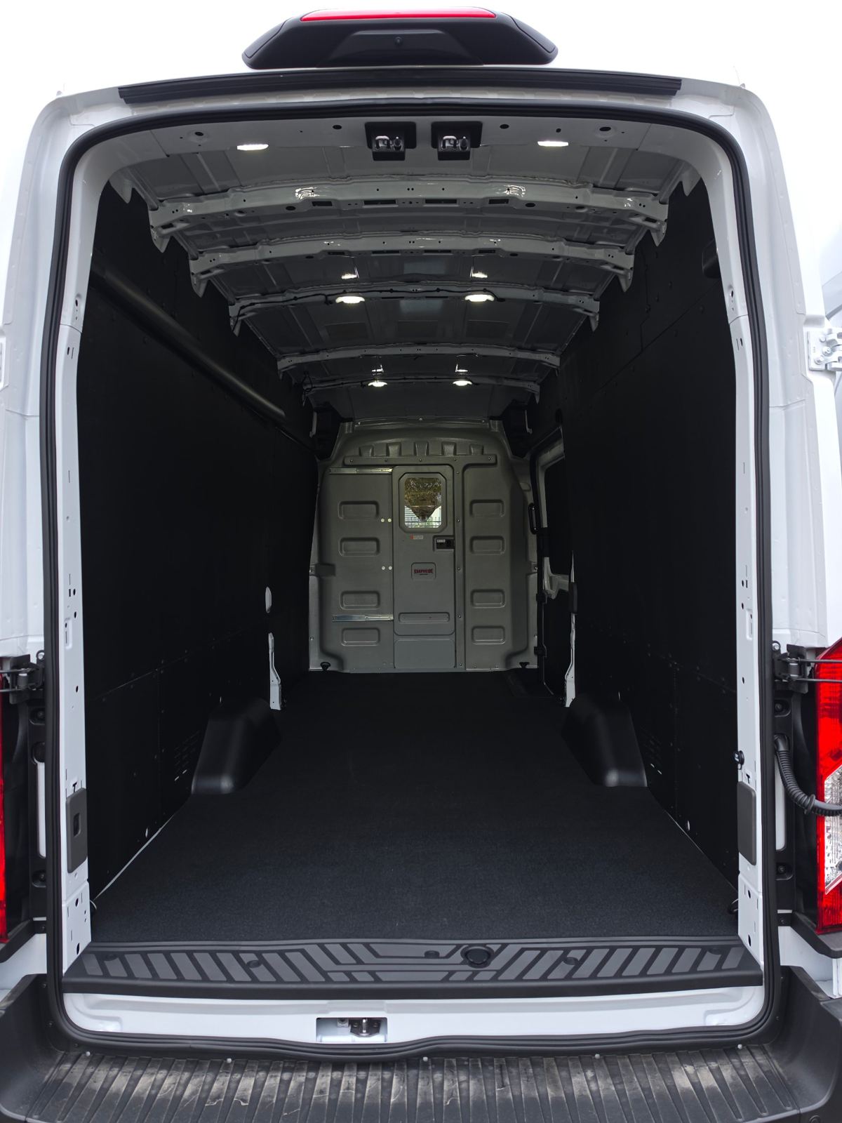 Close view into the lined cargo area with LED lights