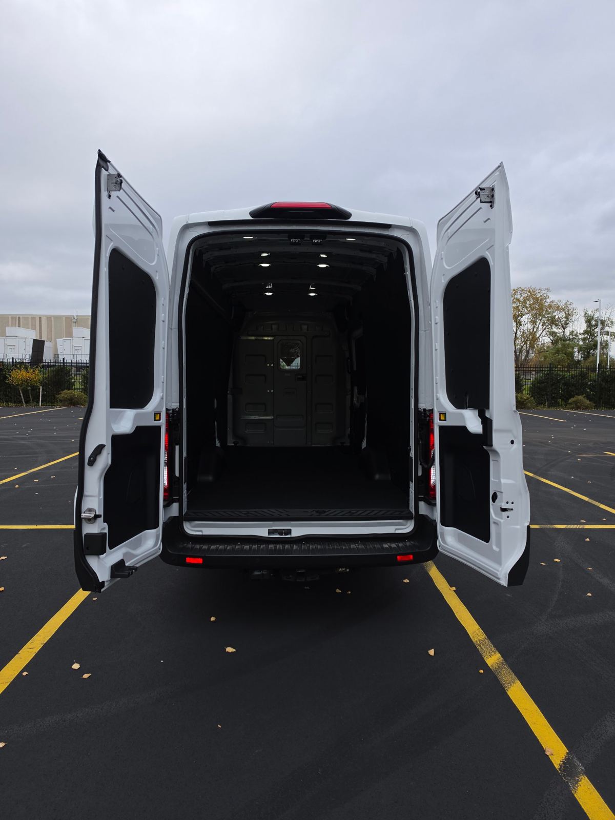 Rear doors swung fully open showing the empty cargo bay
