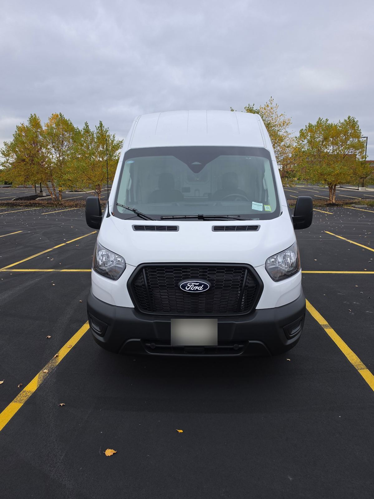 Front view of the van with New York commercial plates